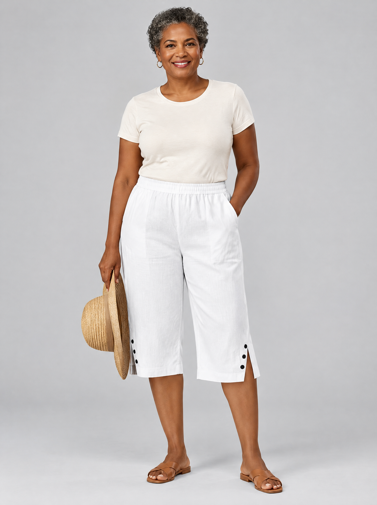 Neva lightweight comfort shorts in white with button side slits, front view