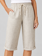 Hulda linen shorts in beige, close up of waistband and fabric
