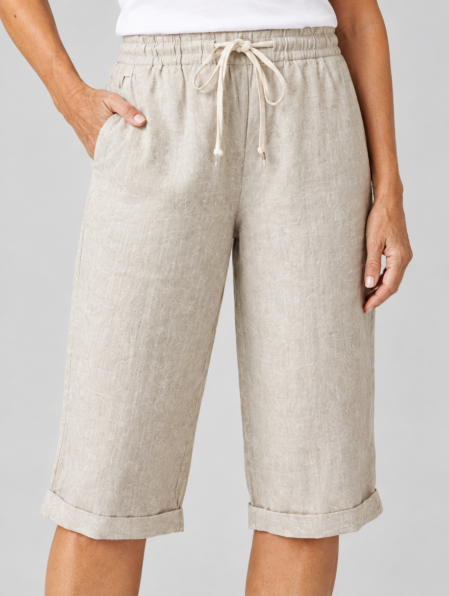Hulda linen shorts in beige, close up of waistband and fabric