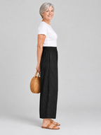 Quinta linen pants, black pair from the pack of 5, side view