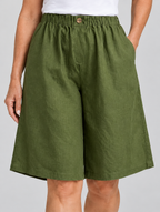 Polly linen shorts in army green, close up of waistband and fabric