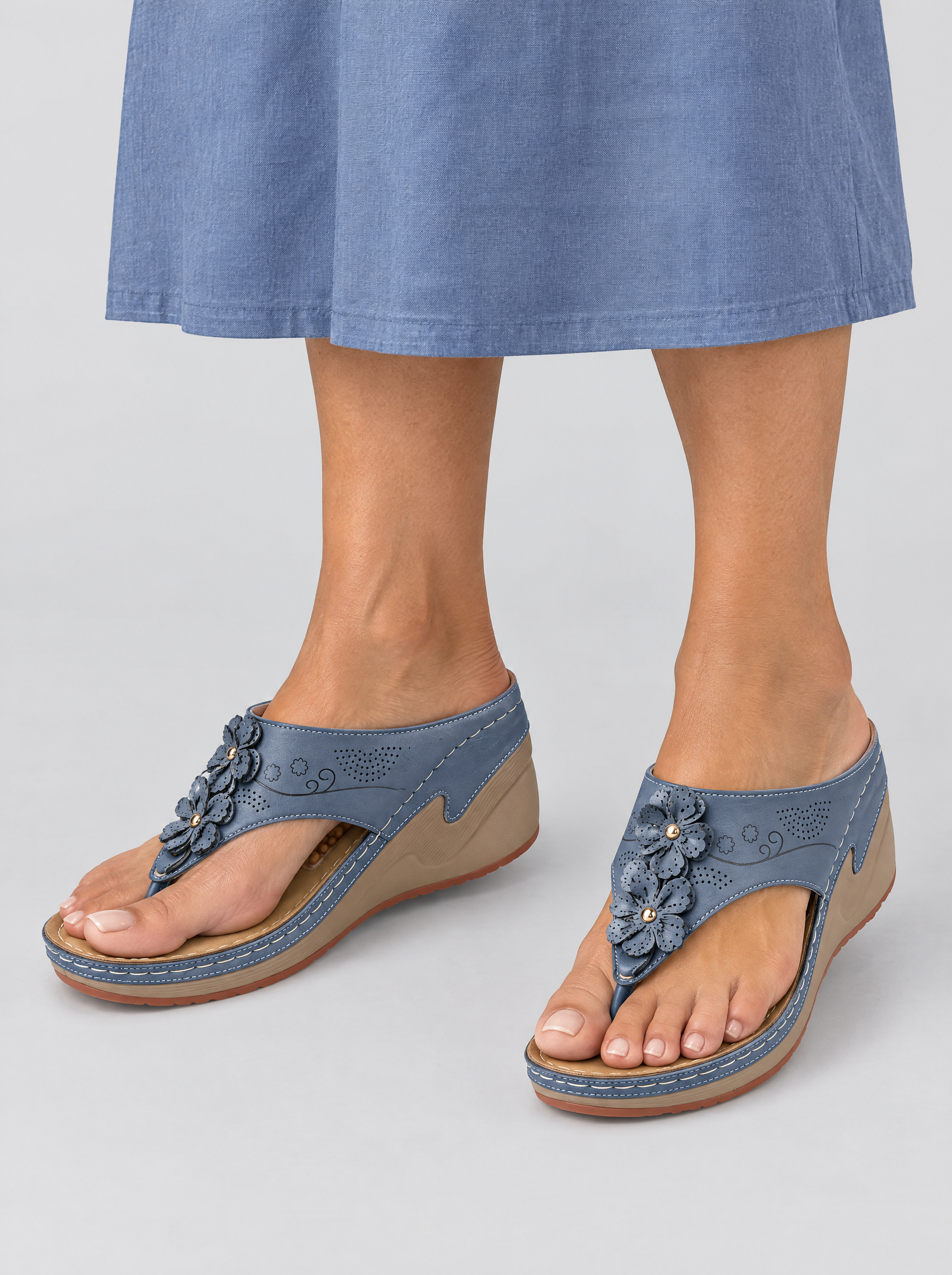 Mila sandals in blue, worn with a dusty blue linen skirt