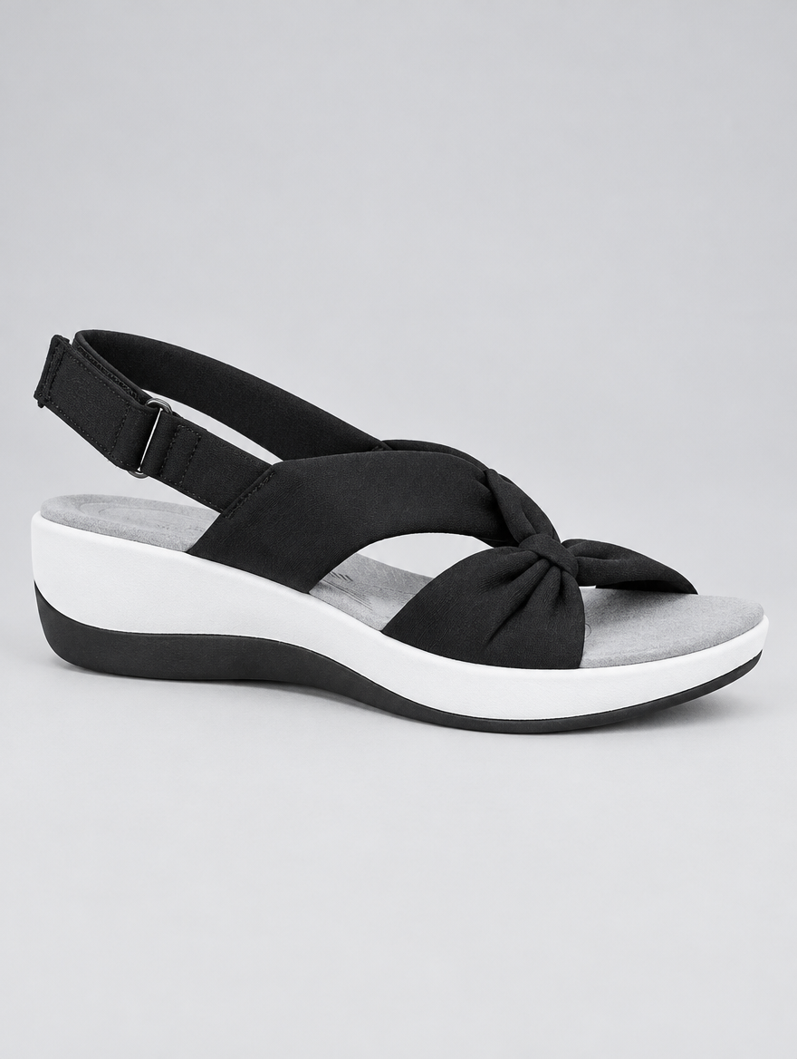 Kiara sandals in black, side view