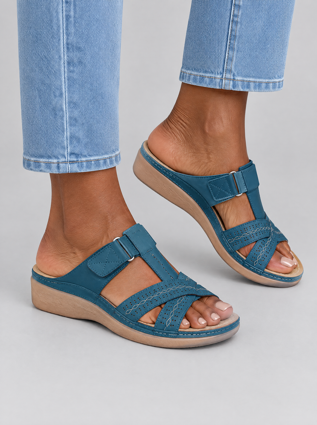 Carys sandals in blue, worn with light blue straight leg jeans