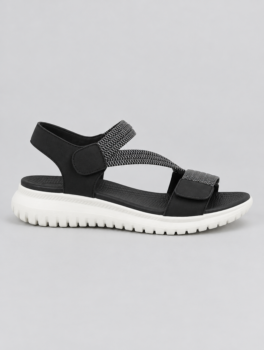 Finley sandals in black, side view