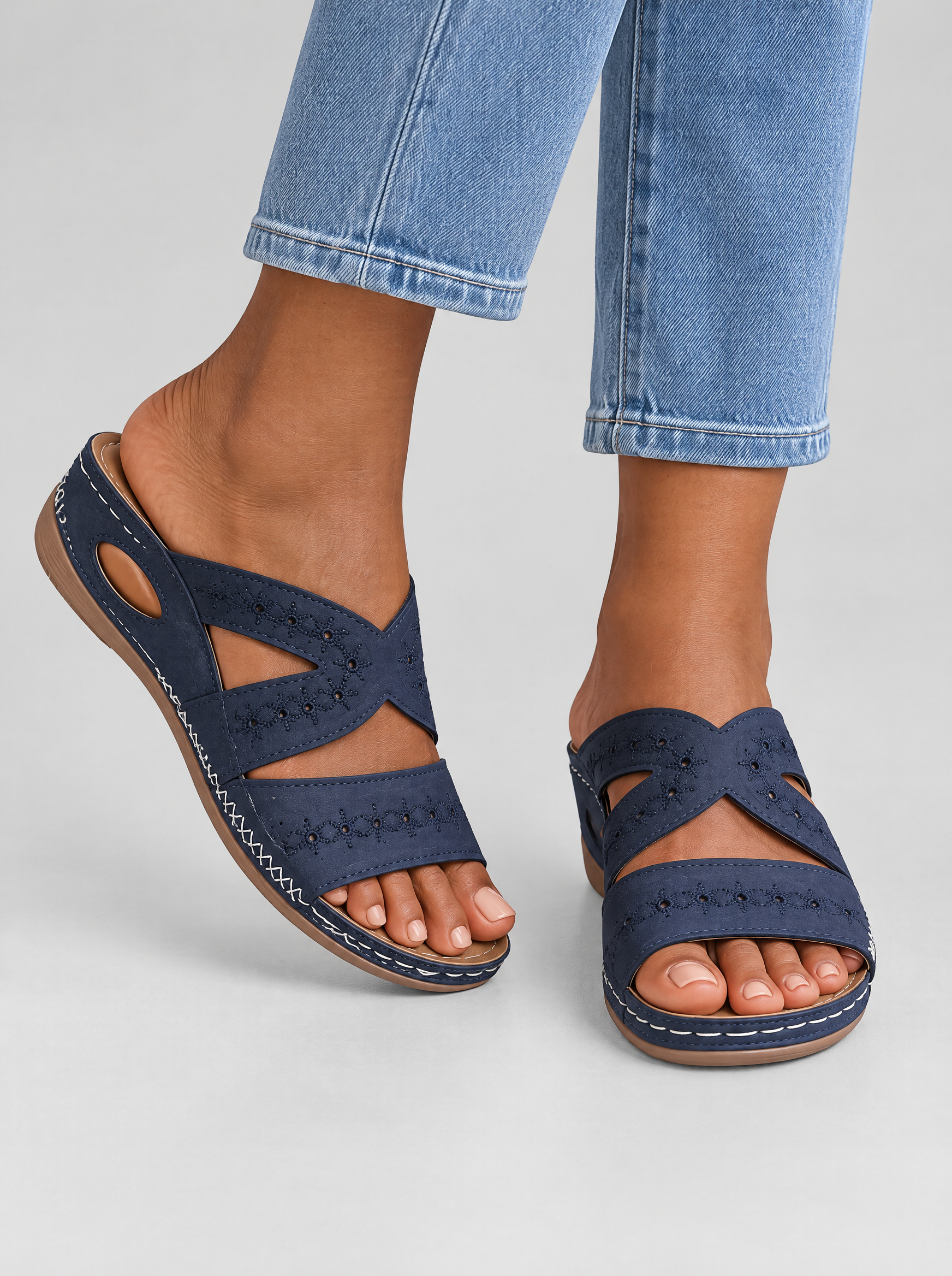 Sandy's sandals in blue, worn with light blue straight leg jeans